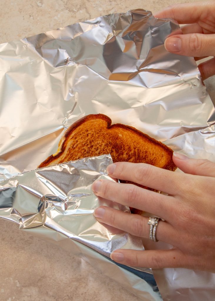 Lunchbox Hack 4; Toasted sandwich being wrapped in aluminum foil