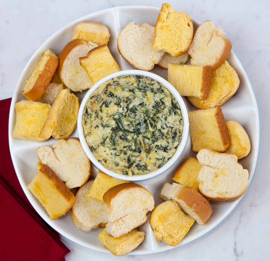 spinach artichoke dip with assorted crostini