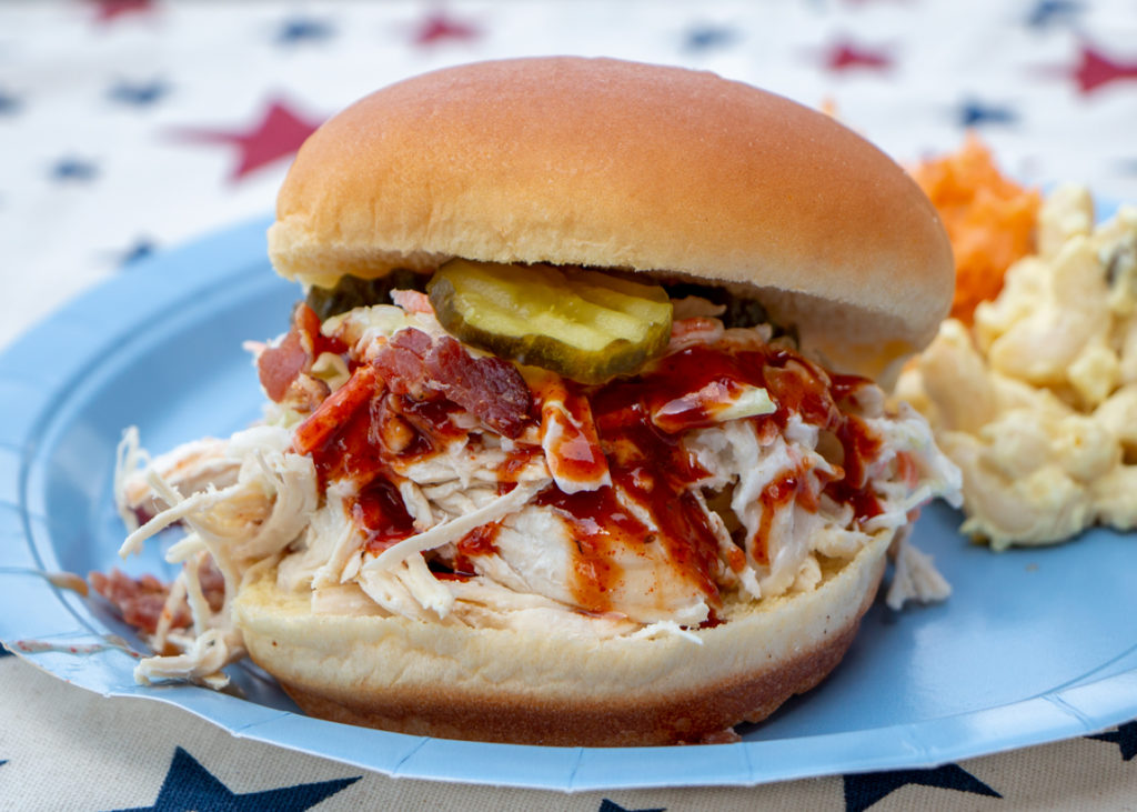 BBQ Pulled Chicken Sandwich with Bacon, Pickles, and Cole Slaw