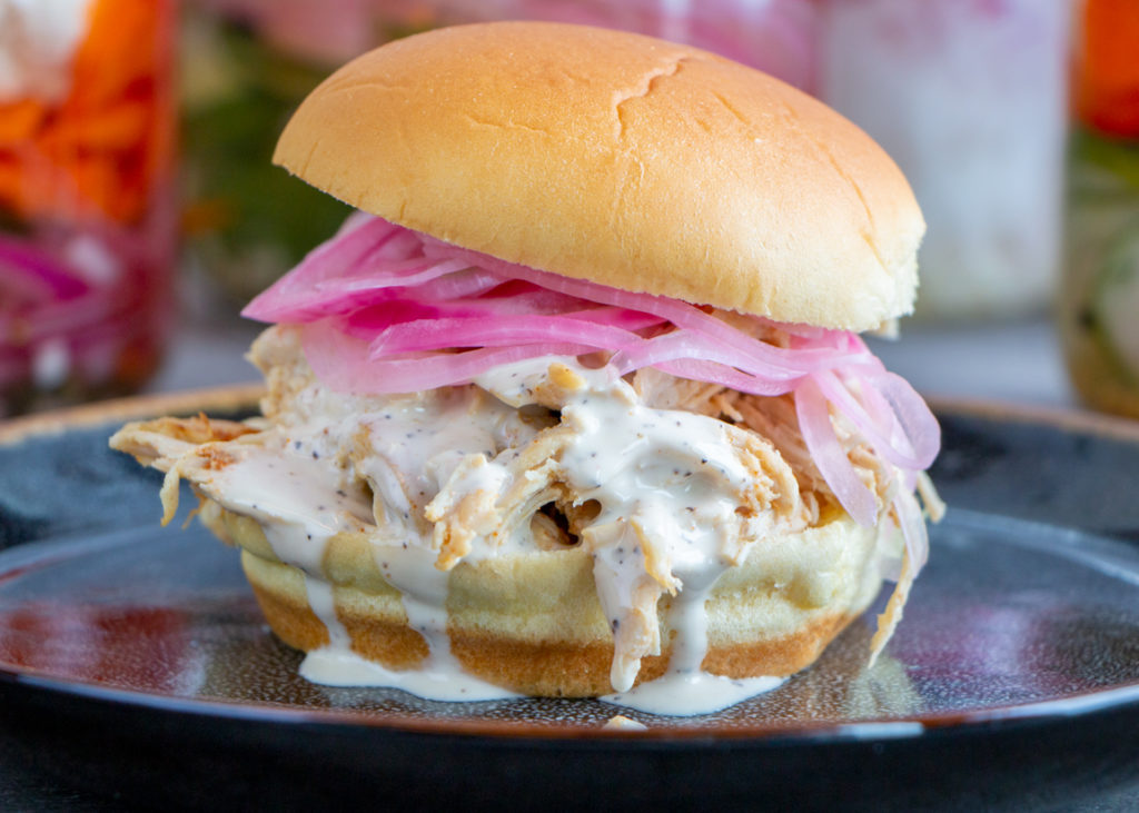 Alabama Pulled Chicken Sandwich with Pickled Onions