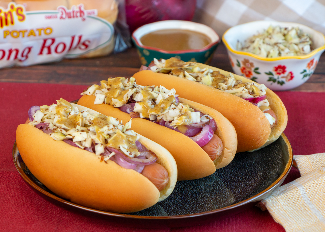 PA Dutch Dog with Maple Mustard, Pickled Cabbage, and Grilled Onions -  Martin's Famous Potato Rolls and Bread